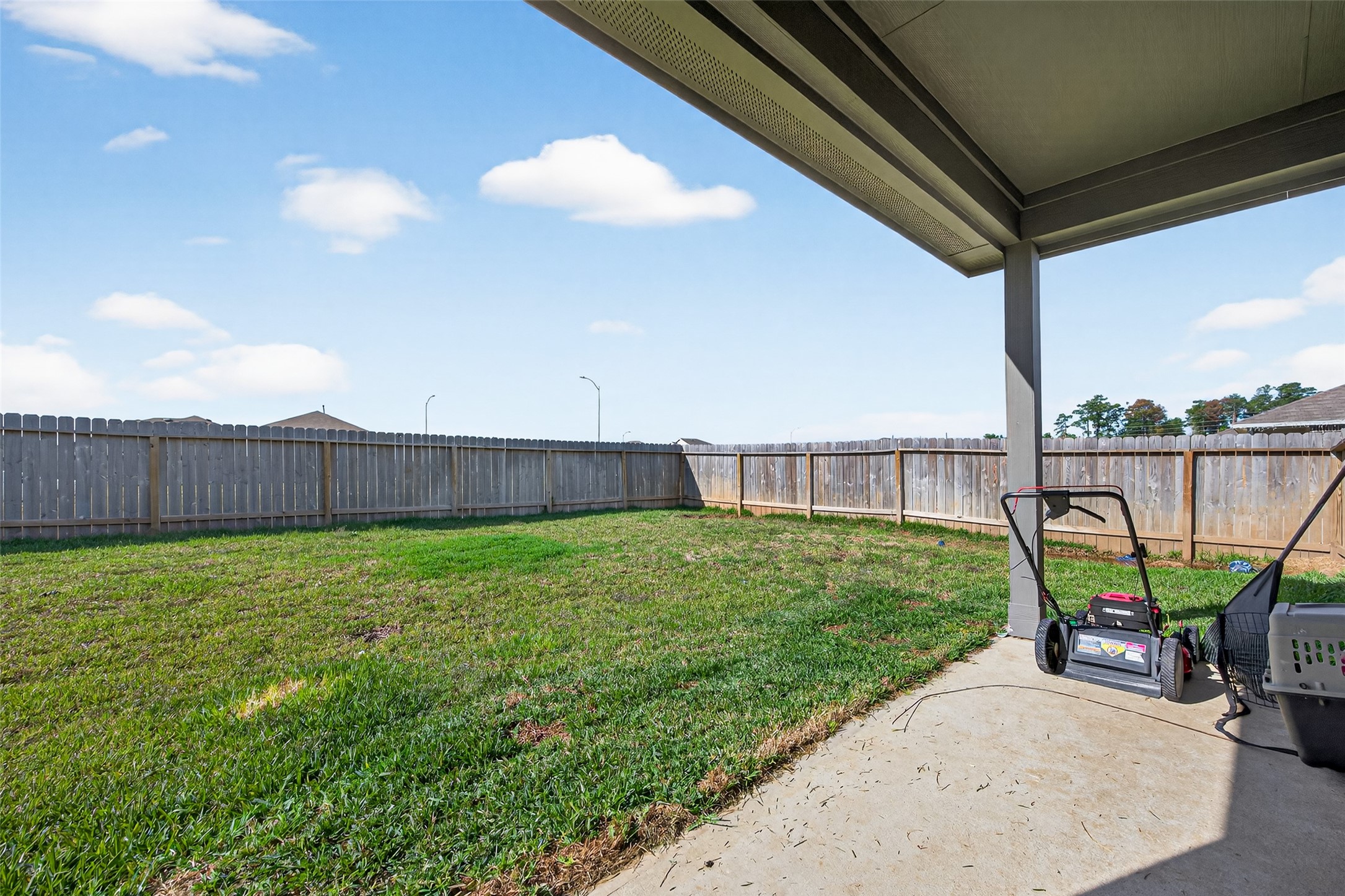 24251 Copperleaf Bay Ln Spring Spring, TX 77373 - Photo 36 of 42 a view of a backyard with a garden and plants