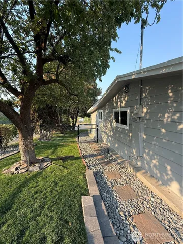 a view of a golf course with a lake view