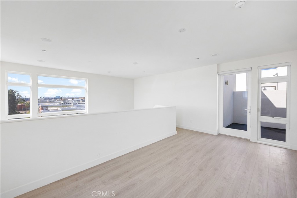 168 South Monterey Street, Unit 518 Alhambra, CA 91801 - Photo 18 of 45 an empty room with a window