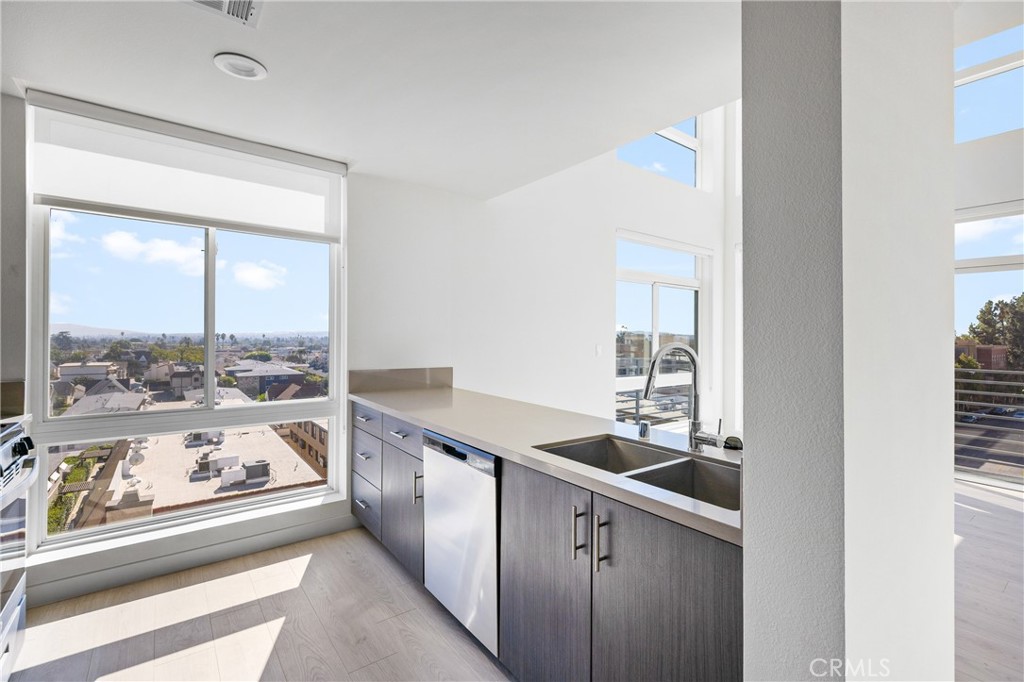 168 South Monterey Street, Unit 518 Alhambra, CA 91801 - Photo 3 of 45 a kitchen with a sink and large window