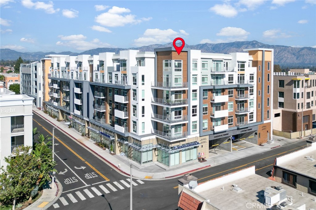 168 South Monterey Street, Unit 518 Alhambra, CA 91801 - Photo 37 of 45 a view of a living room and a book shelf