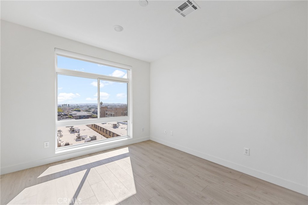 168 South Monterey Street, Unit 518 Alhambra, CA 91801 - Photo 7 of 45 a view of a living room hardwood and a window