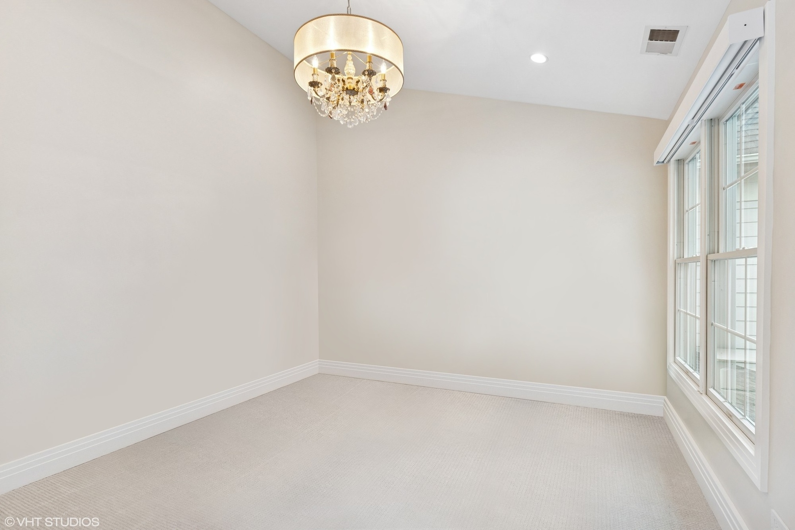 37 Harborside Way Hawthorn Woods, IL 60047 - Photo 17 of 28 an empty room with a chandelier