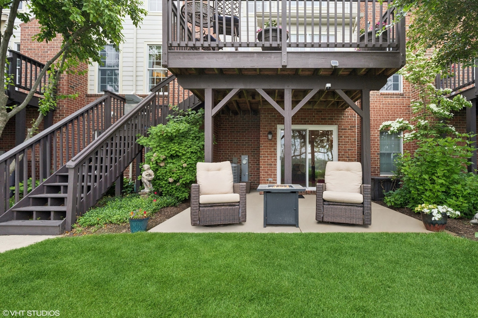 37 Harborside Way Hawthorn Woods, IL 60047 - Photo 27 of 28 a view of a chair and table in the backyard of the house