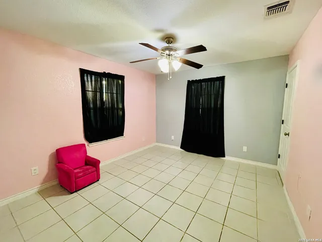 a bedroom with a bed and a closet