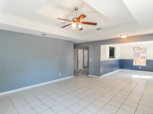 a view of an empty room and window
