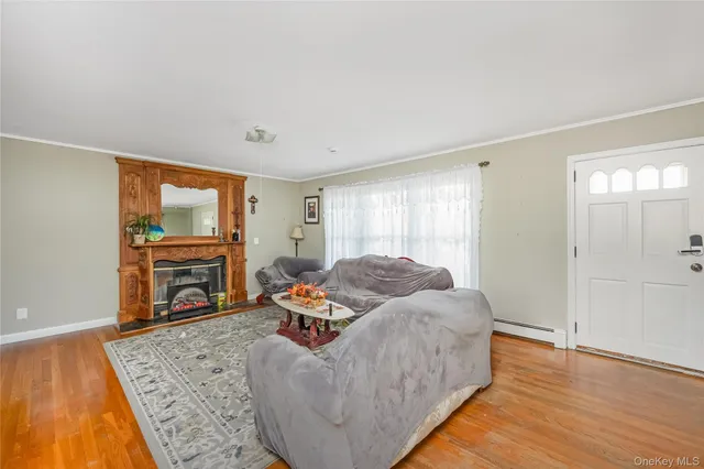 a living room with furniture and a table