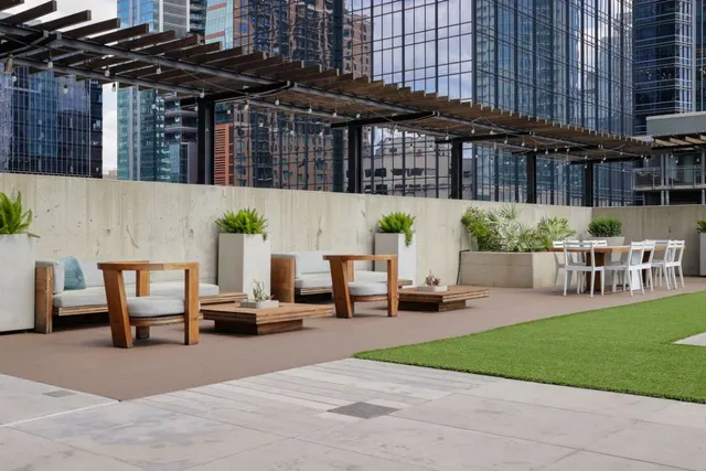 a view of a swimming pool with chairs