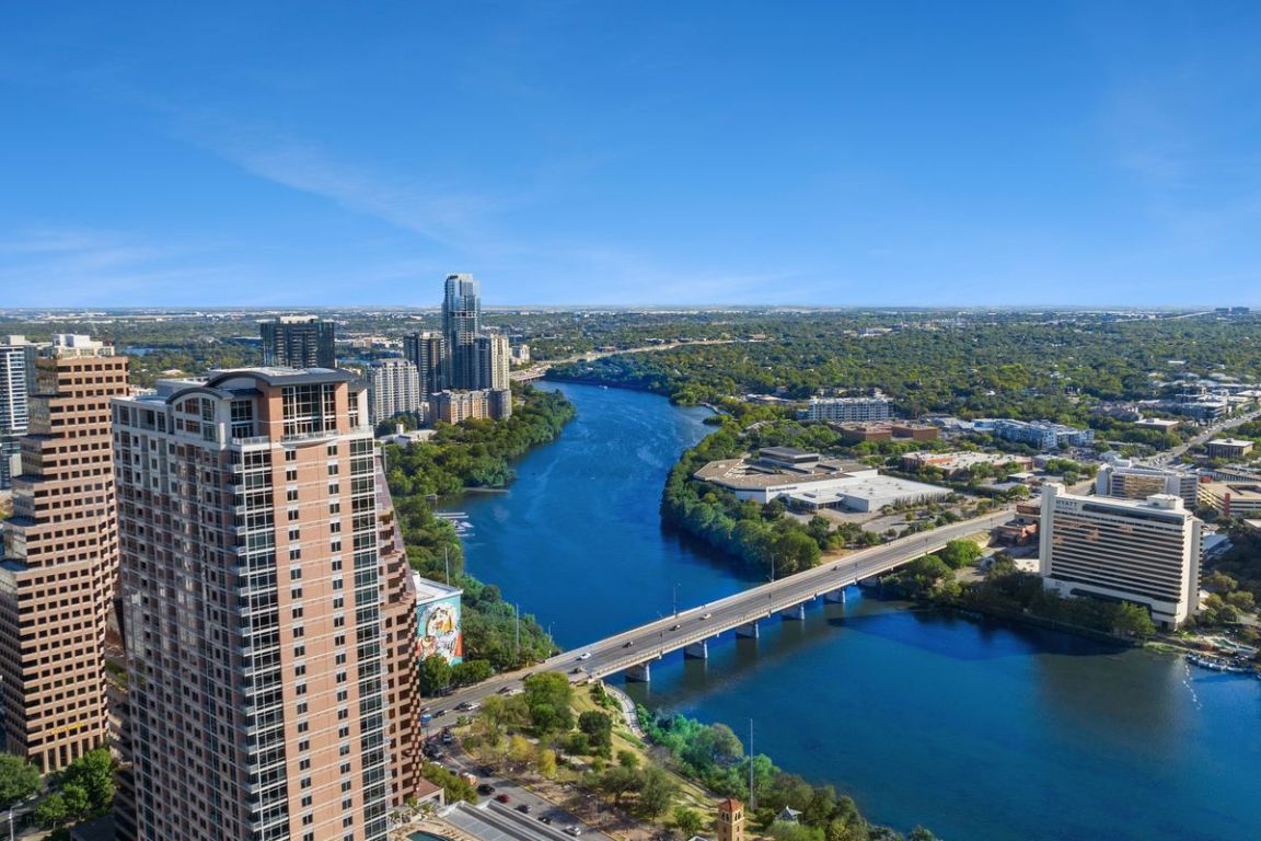 210 Lavaca Street, Unit 2809 Austin, TX 78701 - Photo 2 of 30 View of urban area with a nearby body of water and a notable bridge