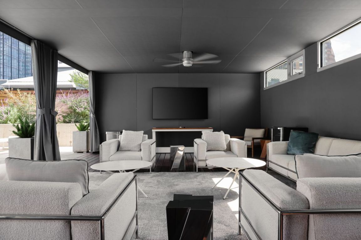 210 Lavaca Street, Unit 2809 Austin, TX 78701 - Photo 22 of 30 Living room with carpet floors and ceiling fan