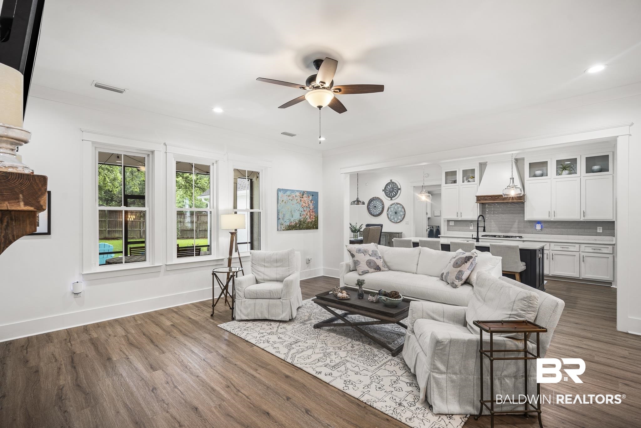 21702 Pillars Street Fairhope, AL 36532 - Photo 10 of 54 Open-concept living space with wood-finish flooring, recessed lighting, and a ceiling fan