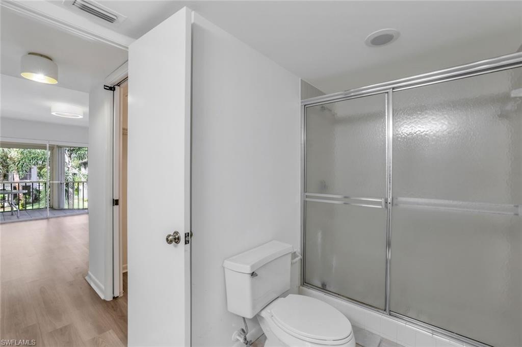 3200 Binnacle Drive, Unit B4 Naples, FL 34103 - Photo 15 of 25 a bathroom with a toilet and a shower