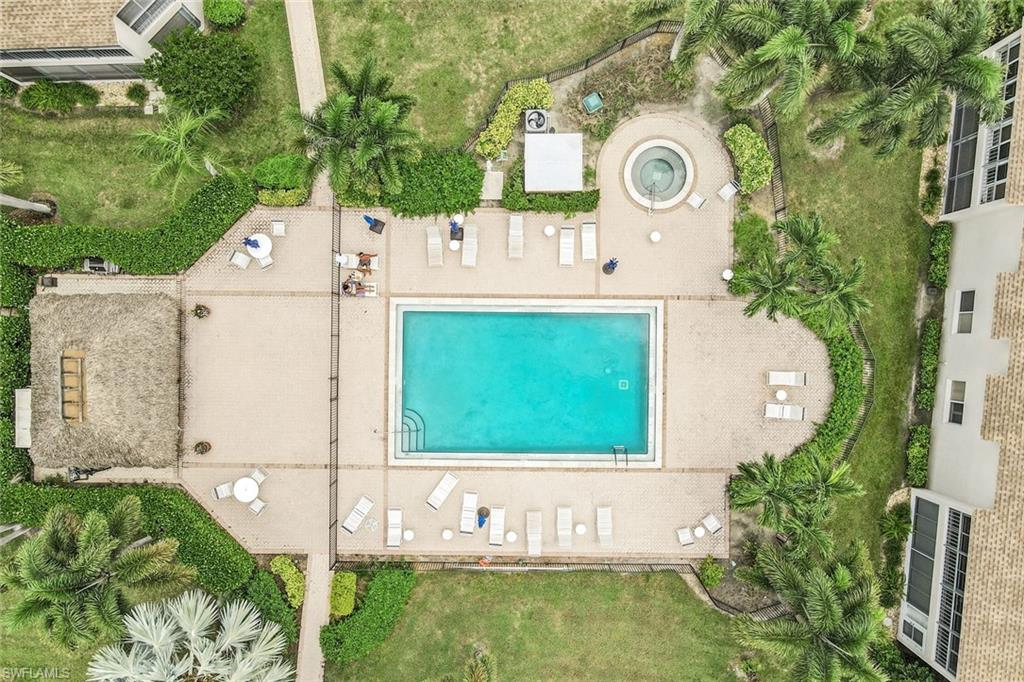 3200 Binnacle Drive, Unit B4 Naples, FL 34103 - Photo 18 of 25 an aerial view of a house with garden space and street view