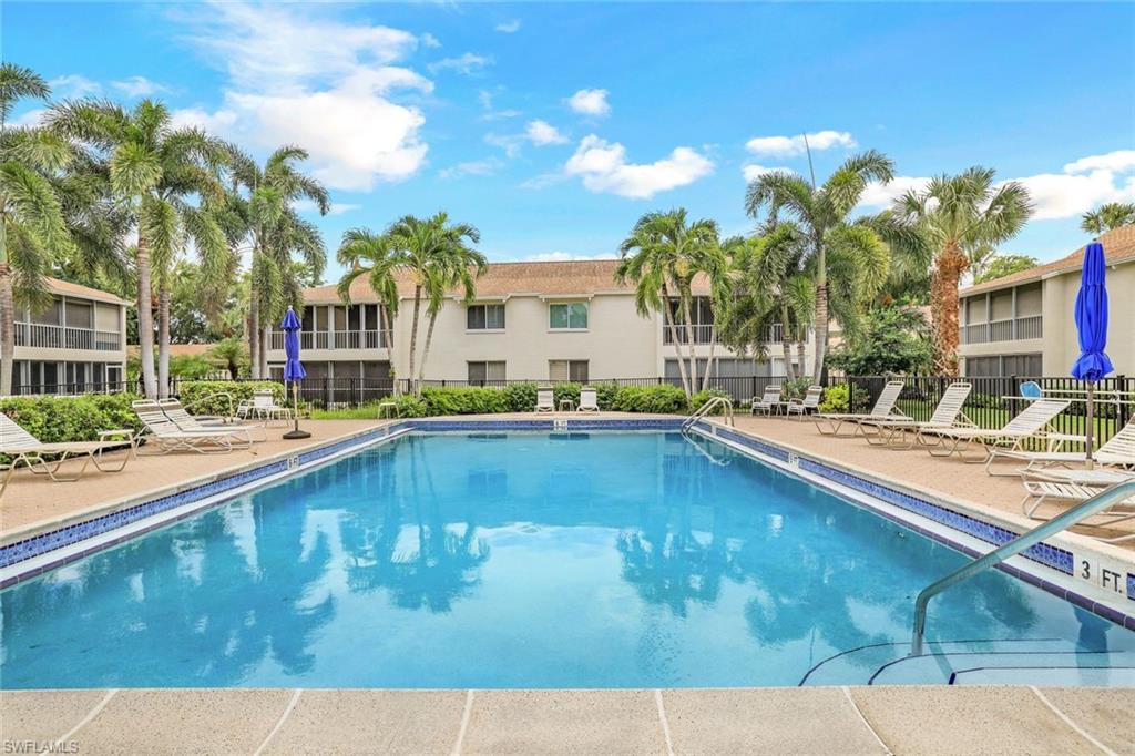 3200 Binnacle Drive, Unit B4 Naples, FL 34103 - Photo 19 of 25 a swimming pool view with a outdoor seating