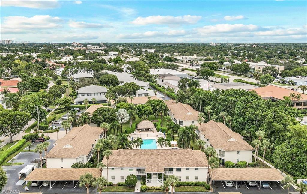 3200 Binnacle Drive, Unit B4 Naples, FL 34103 - Photo 24 of 25 an aerial view of residential houses with outdoor space