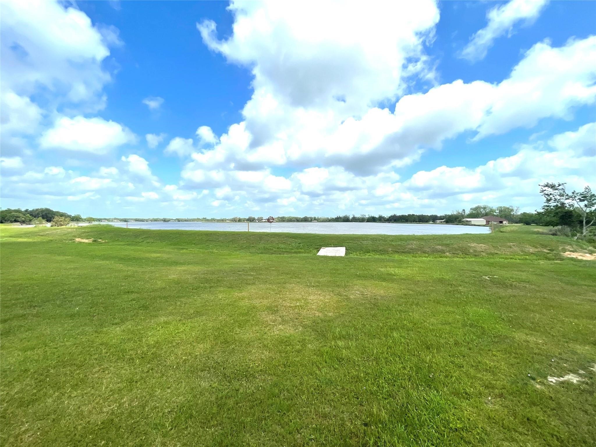 912 Wagon Wheel Trail Angleton, TX 77515 - Photo 9 of 11 a view of a big yard with lots of green space