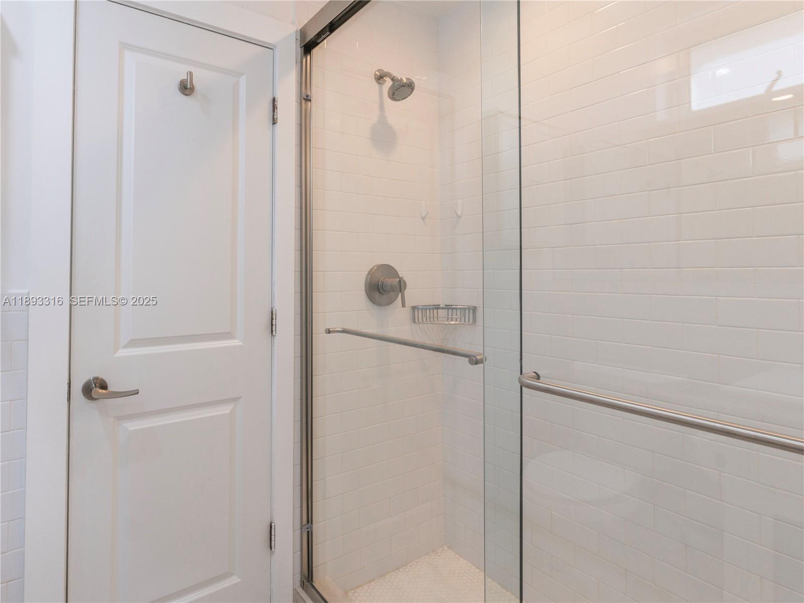 241 28th Street, Unit 1 Miami Beach, FL 33140 - Photo 15 of 16 a bathroom with a shower