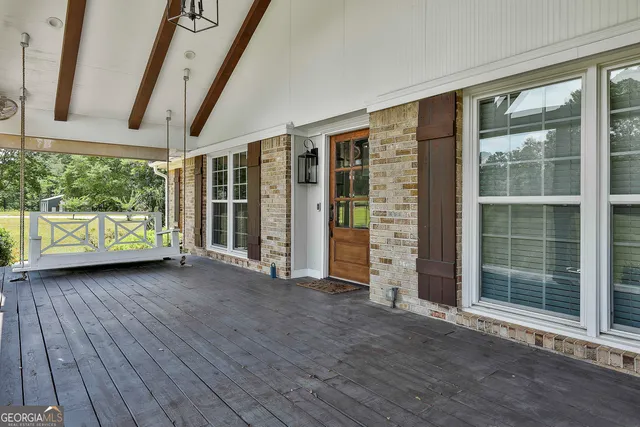 a view of entryway with wooden floor