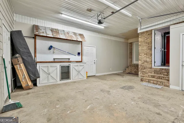 a view of empty room with large window