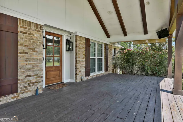 a view of backyard with green space