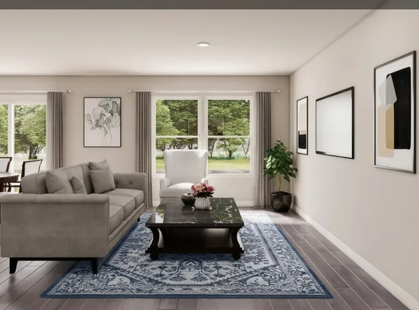 a living room with furniture and a rug