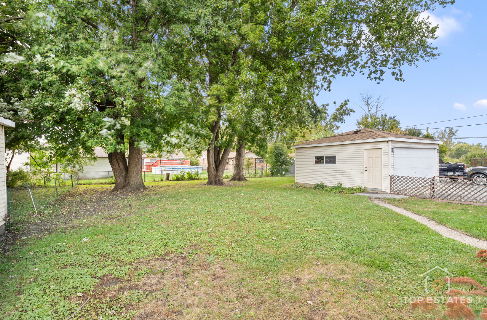 15450 Millard Avenue Markham, IL 60428 - Photo 31 of 42 a view of a house with a backyard