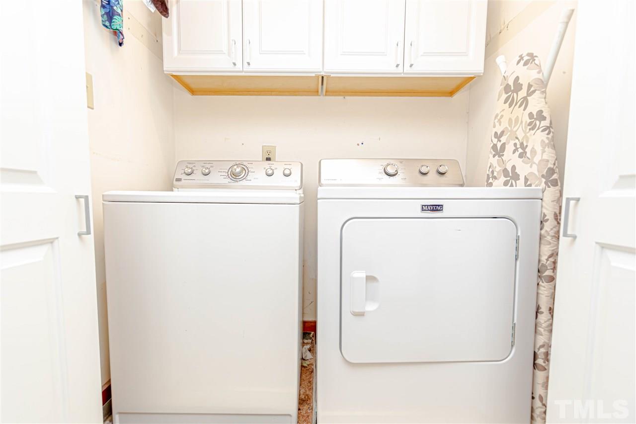 2521 Scouting Trail Raleigh, NC 27615 - Photo 21 of 29 a utility room with dryer and washer