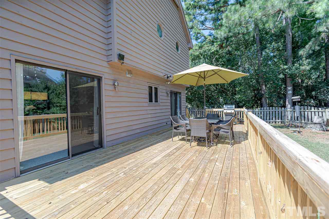 2521 Scouting Trail Raleigh, NC 27615 - Photo 27 of 29 a view of a chair and tables in the balcony