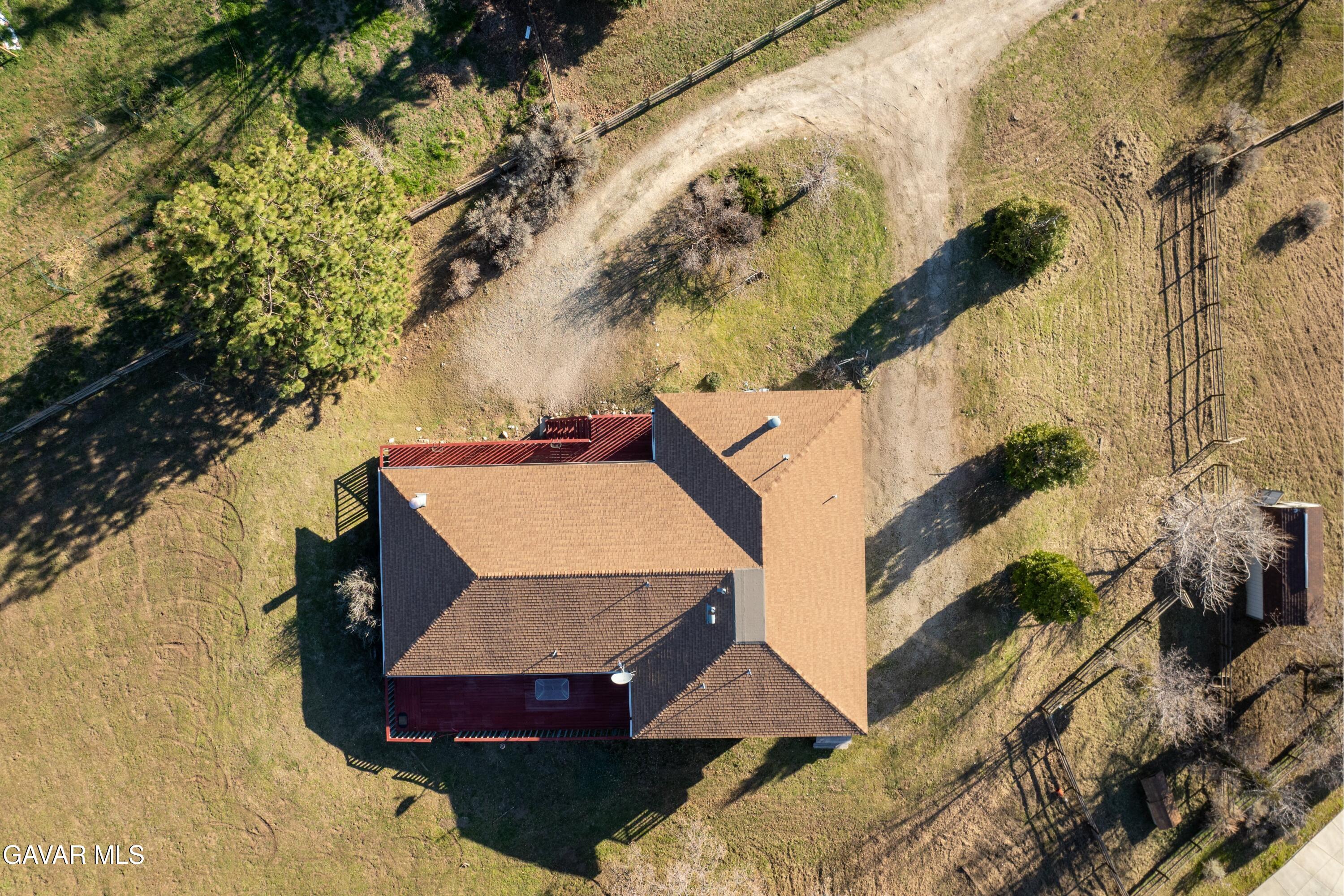 26181 Bear Valley Road Tehachapi, CA 93561 - Photo 31 of 38 a view of a house with a yard