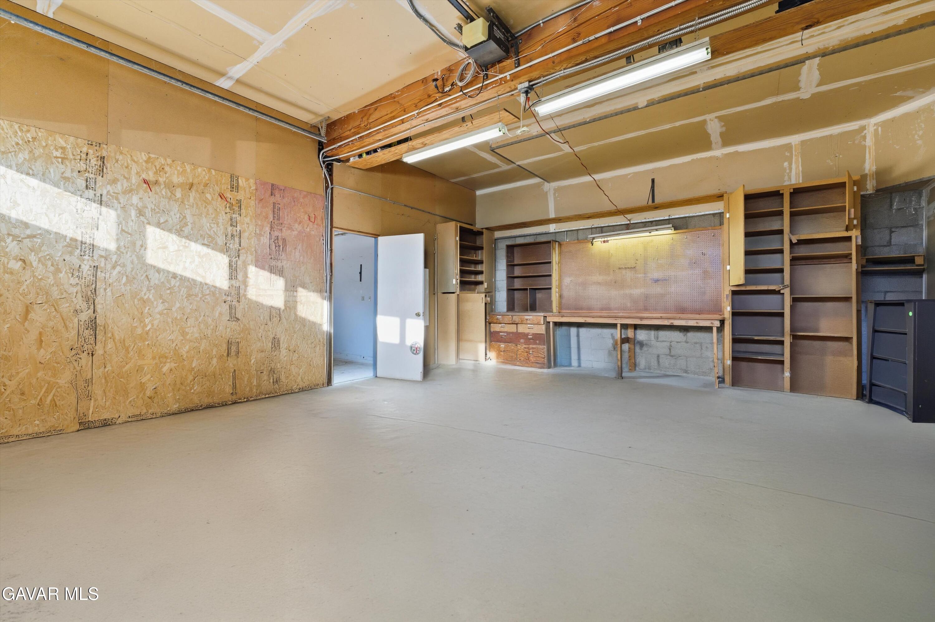 26181 Bear Valley Road Tehachapi, CA 93561 - Photo 37 of 38 a view of an empty room with a fireplace