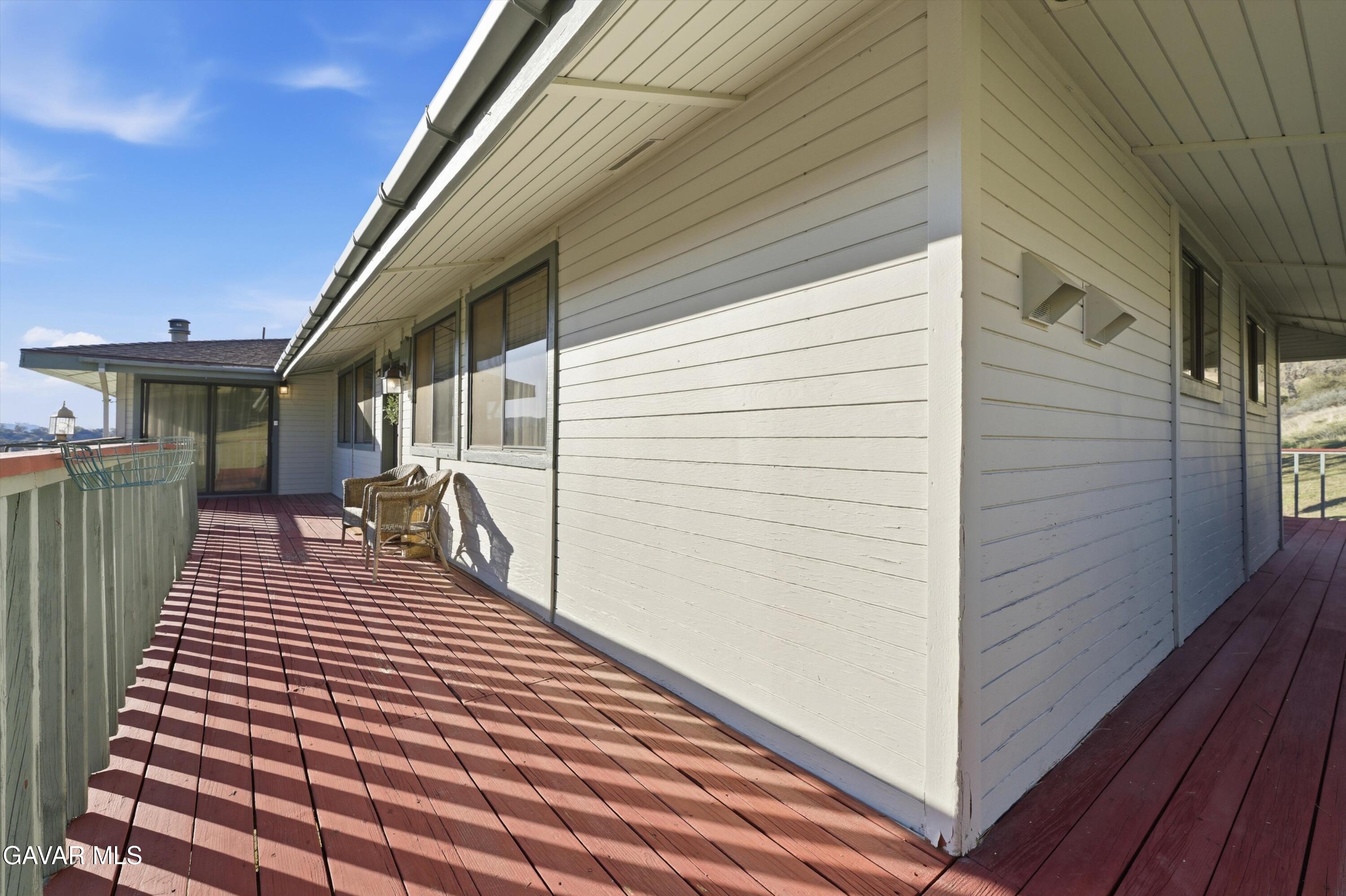 26181 Bear Valley Road Tehachapi, CA 93561 - Photo 4 of 38 a porch with seating space