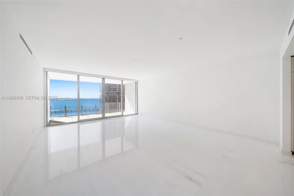 view of an empty room with a window