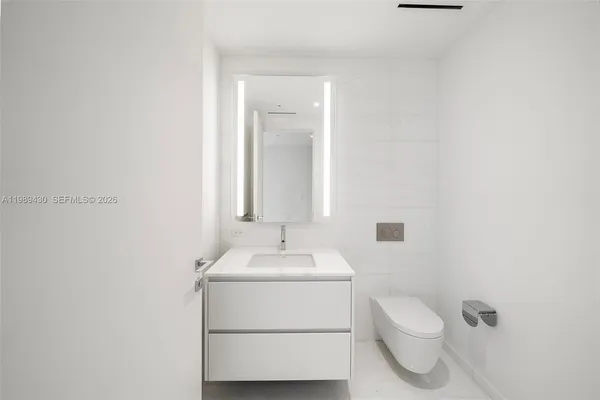 a view of an empty room with a sliding door