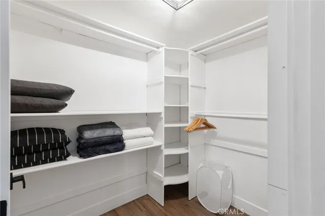 a view of staircase with white walls and windows