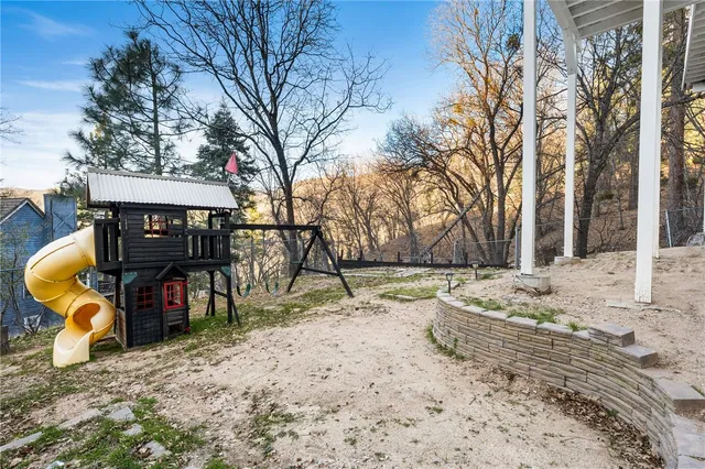 a picture of a bathroom with a shower