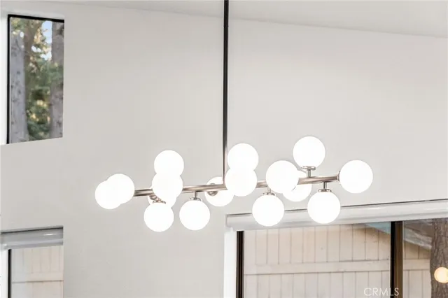 a bathroom with a light fixture and a sink