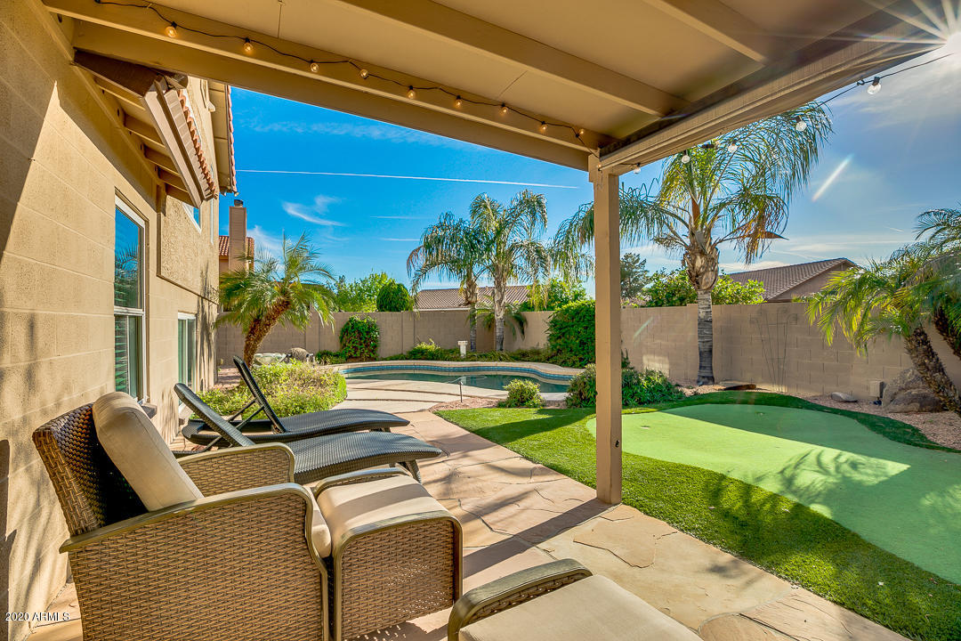 708 South Riata Street Gilbert, AZ 85296 - Photo 49 of 52 a view of a backyard with sitting area