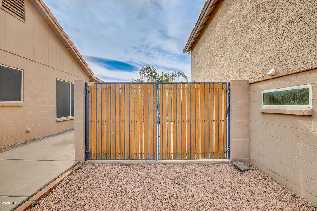 708 South Riata Street Gilbert, AZ 85296 - Photo 50 of 52 a view of backyard with entryway