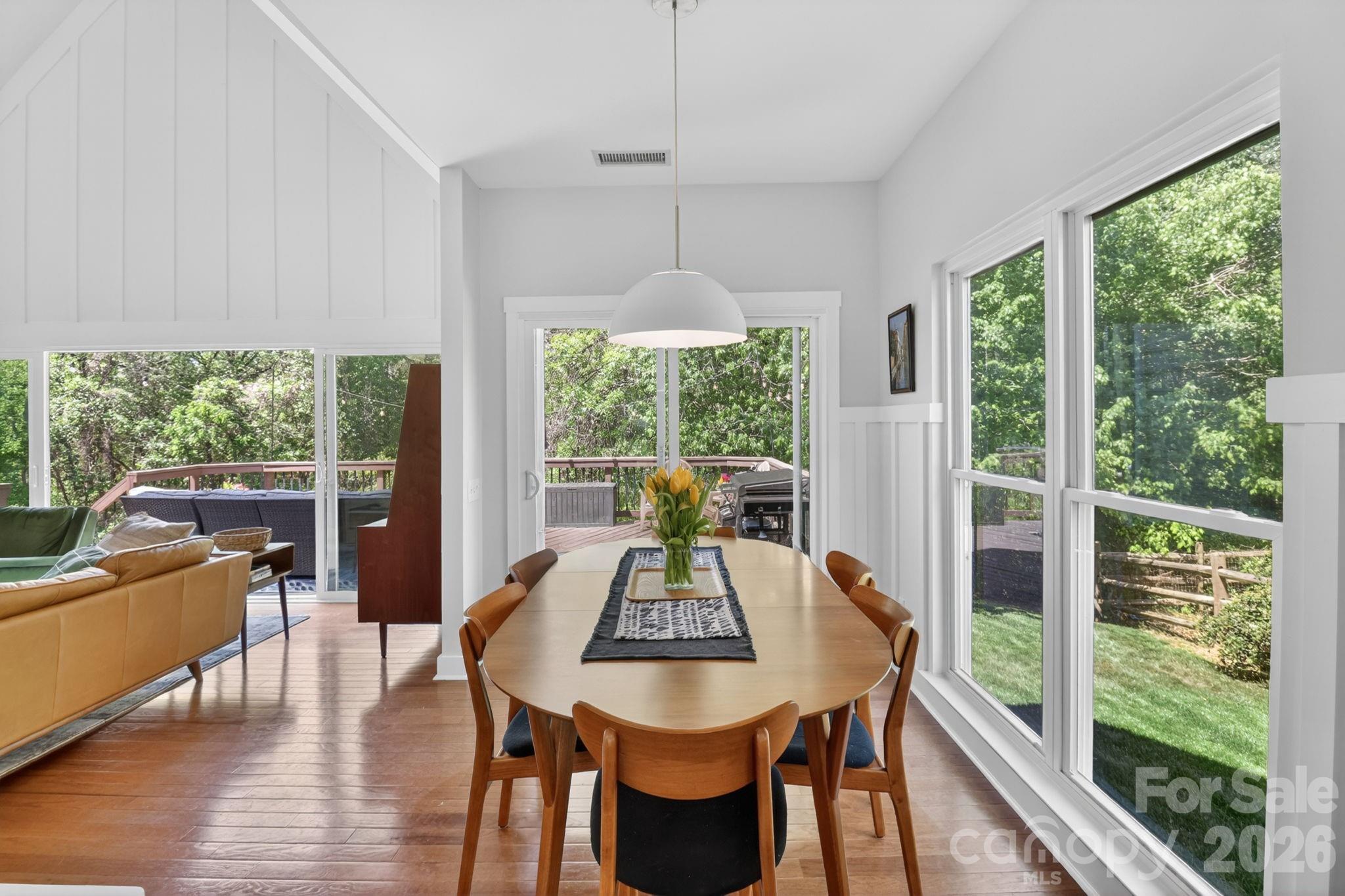 1011 Clearbrook Road Matthews, NC 28105 - Photo 12 of 46 a dining room with furniture window and wooden floor