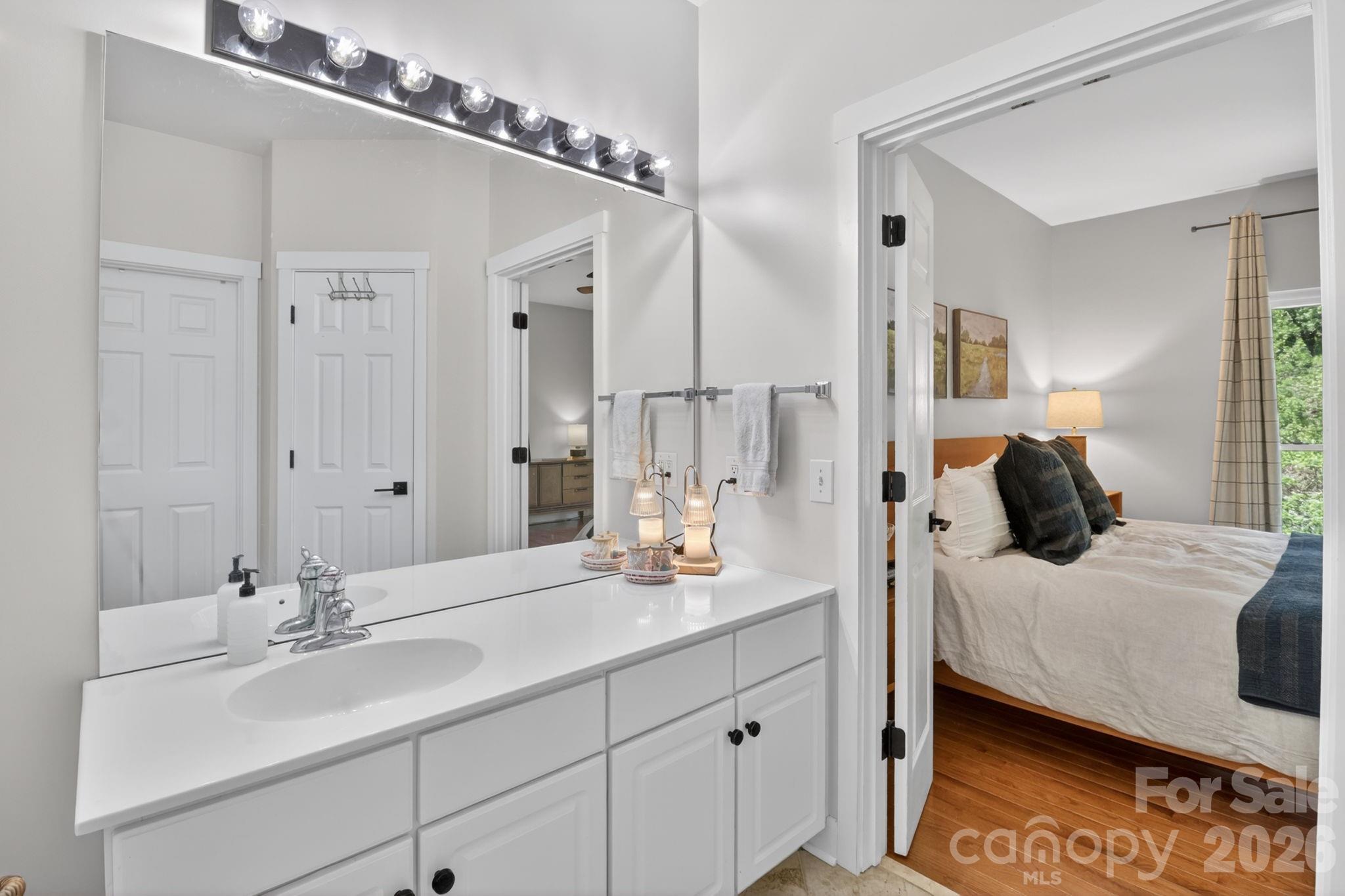 1011 Clearbrook Road Matthews, NC 28105 - Photo 19 of 46 a bathroom with a sink and a mirror