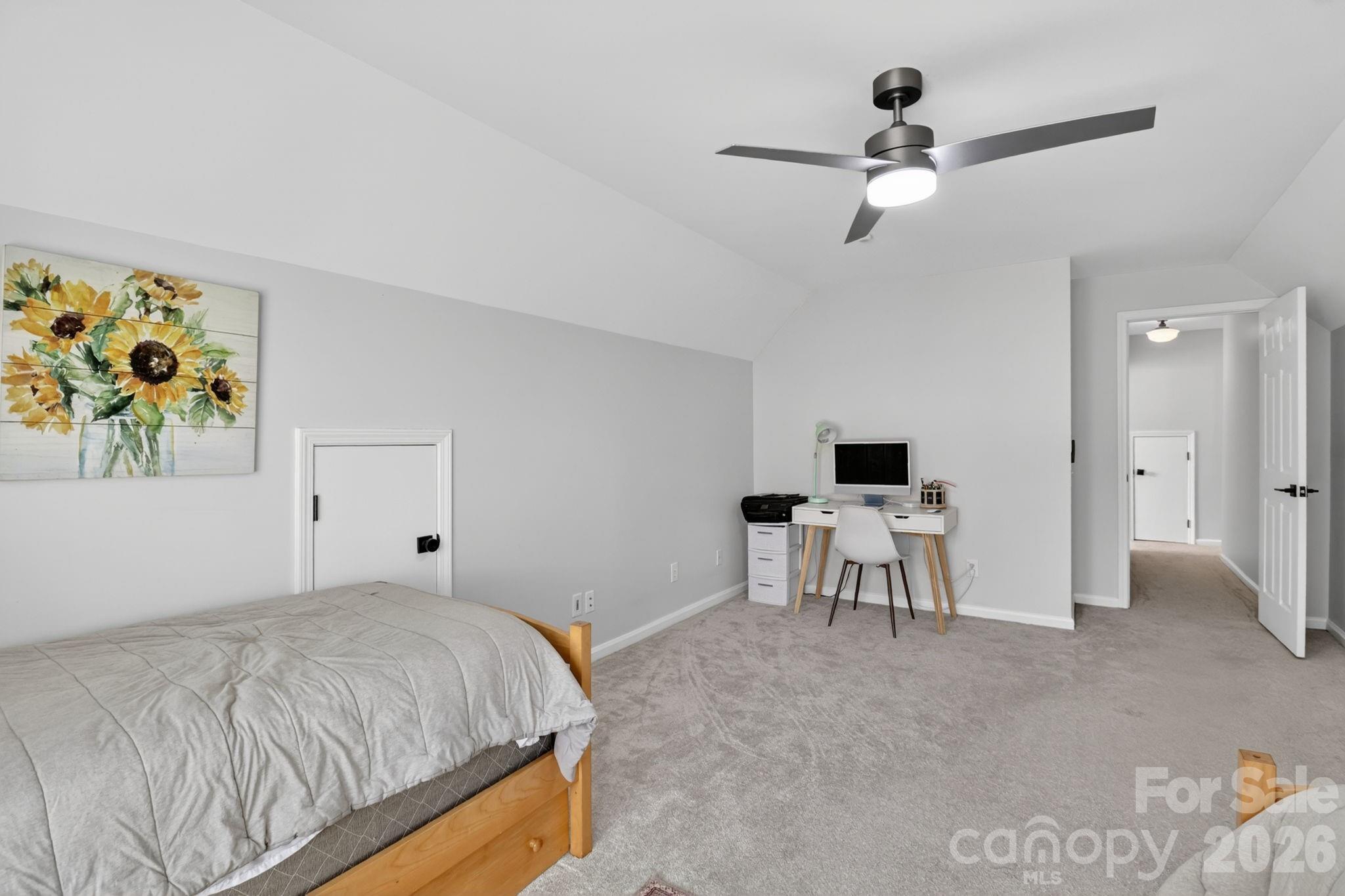 1011 Clearbrook Road Matthews, NC 28105 - Photo 29 of 46 a bedroom with a bed and a table