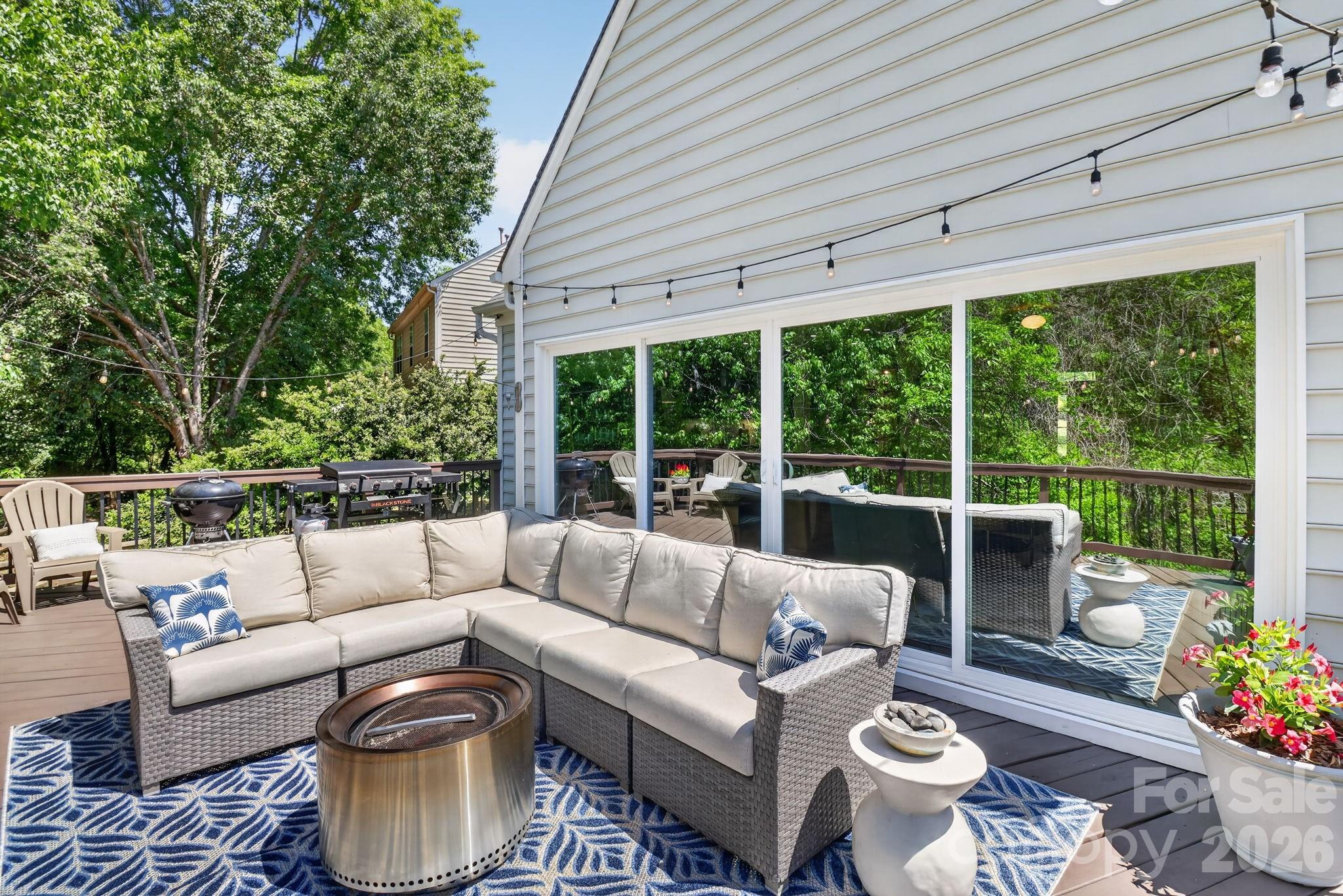 1011 Clearbrook Road Matthews, NC 28105 - Photo 30 of 46 a outdoor living space with furniture and garden view