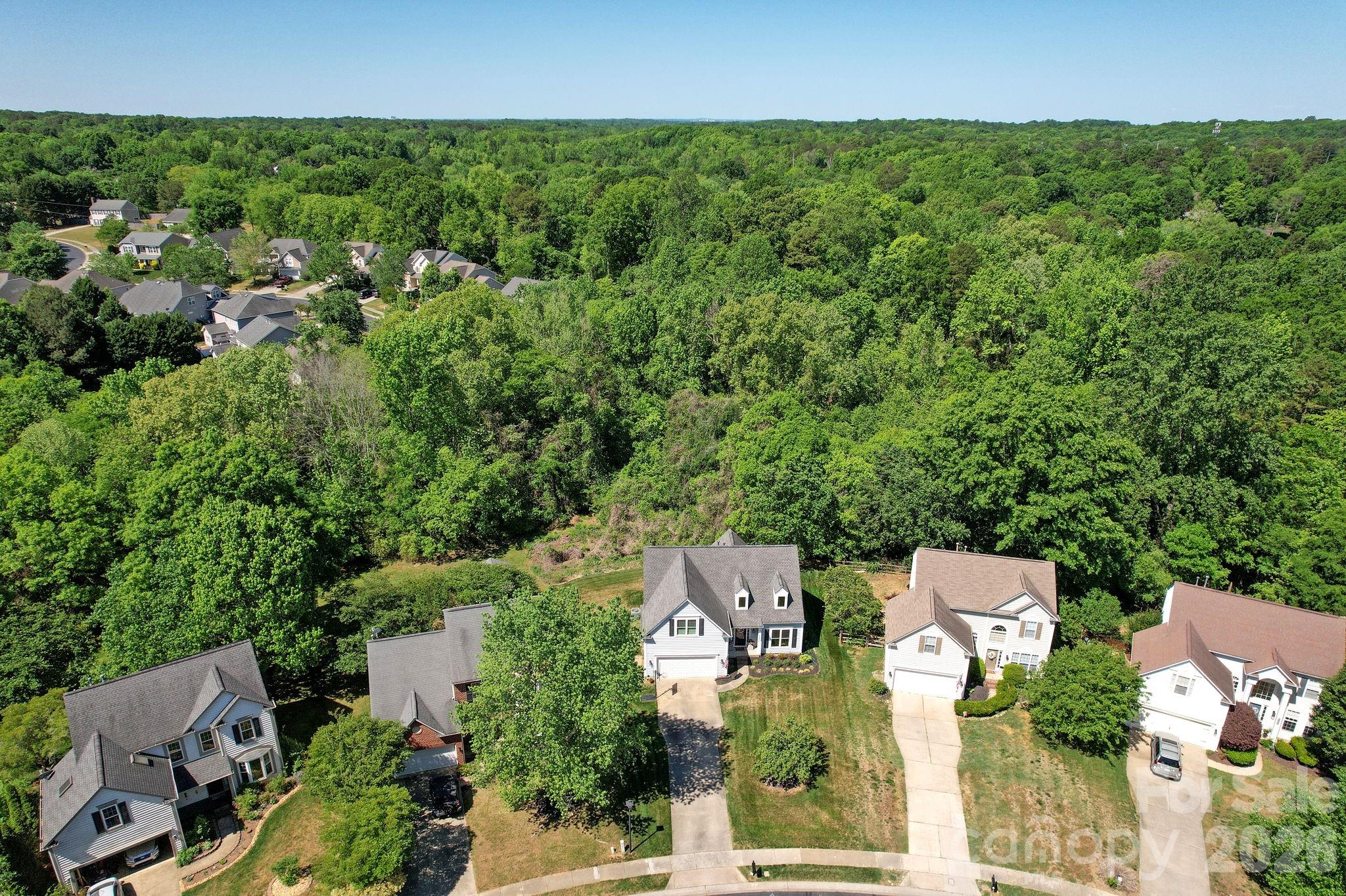1011 Clearbrook Road Matthews, NC 28105 - Photo 43 of 46 an aerial view of residential house with outdoor space and trees all around