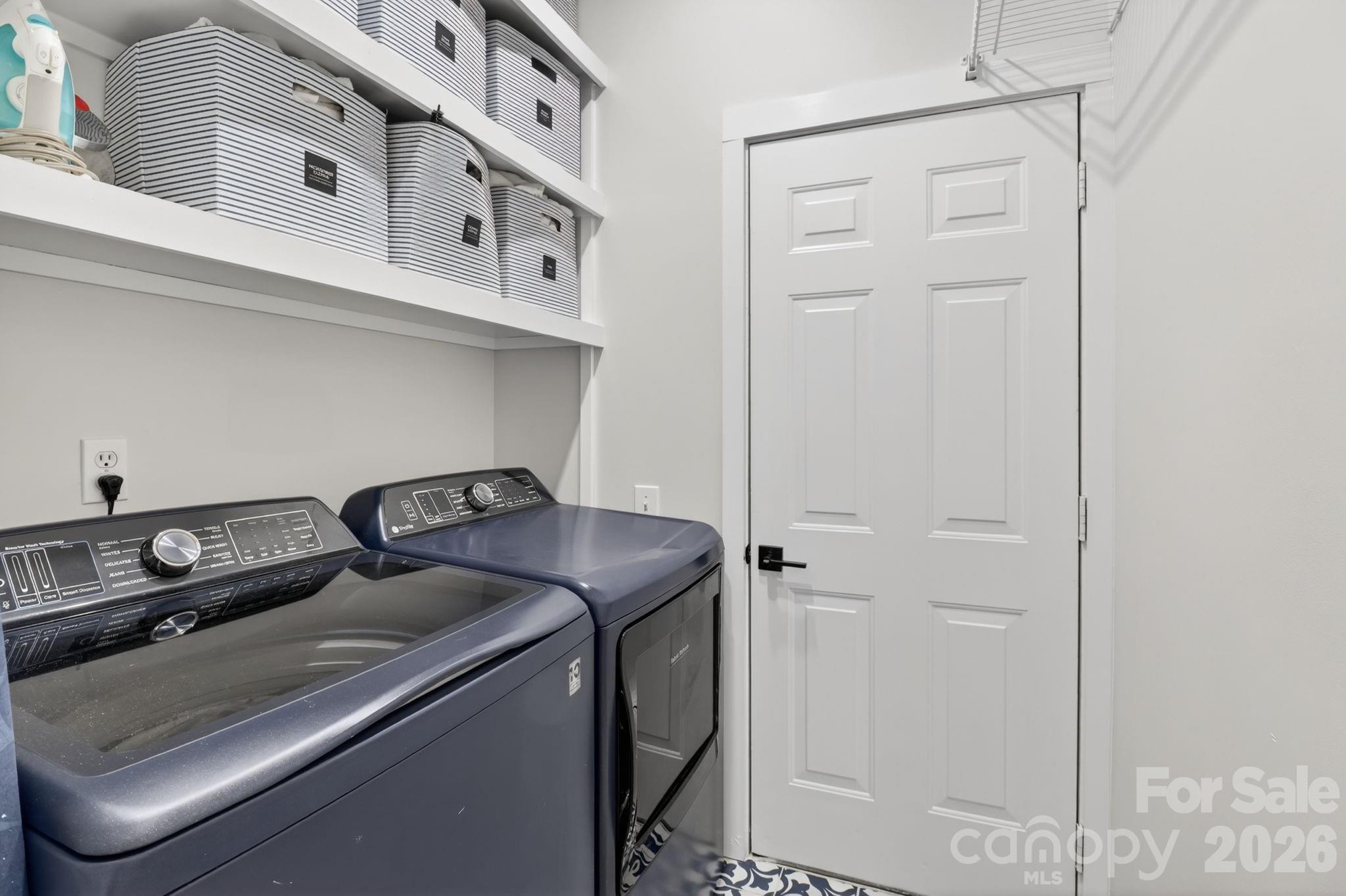 1011 Clearbrook Road Matthews, NC 28105 - Photo 45 of 46 a utility room with dryer and washer