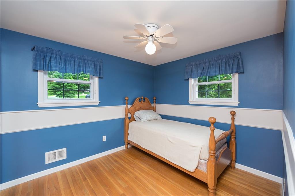 2387 Harrison City Road Export, PA 15632 - Photo 17 of 25 a bedroom with a bed and window