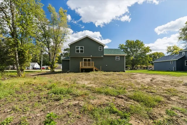 a house view with a garden space