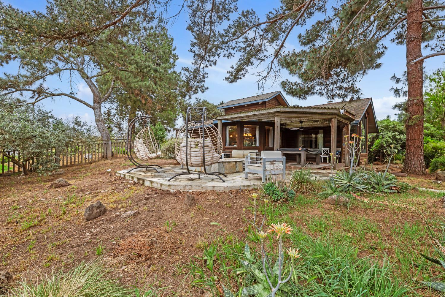 4607 Archerdale Road Linden, CA 95236 - Photo 30 of 50 a front view of a house with garden