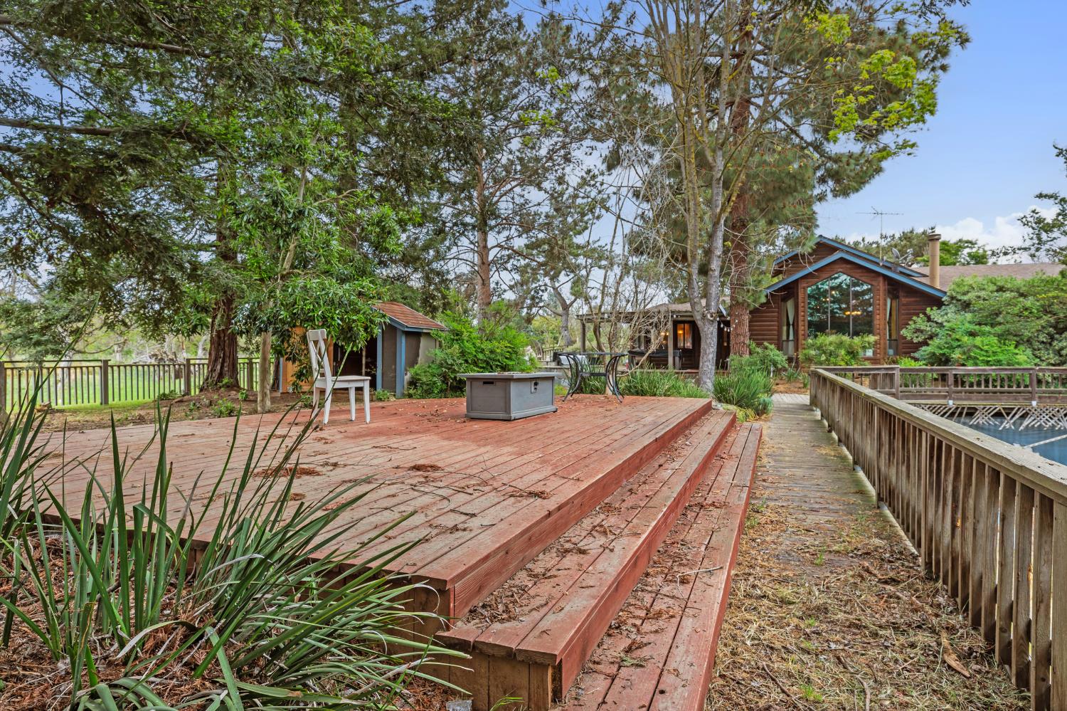4607 Archerdale Road Linden, CA 95236 - Photo 32 of 50 a view of a house with backyard and trees