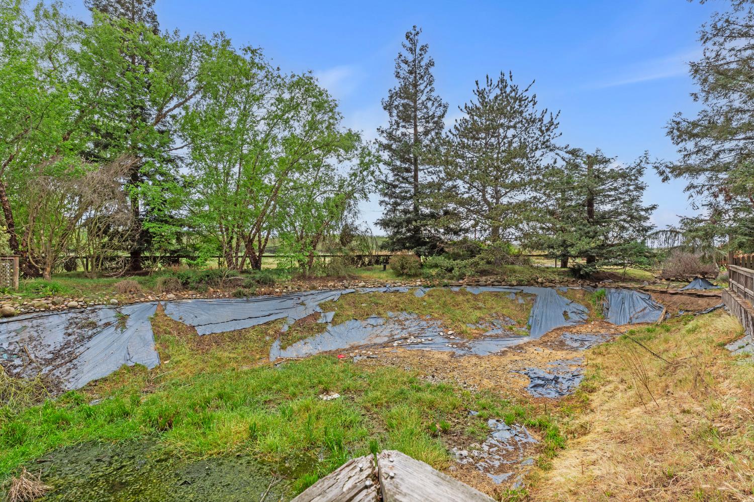 4607 Archerdale Road Linden, CA 95236 - Photo 36 of 50 a view of a lake with houses