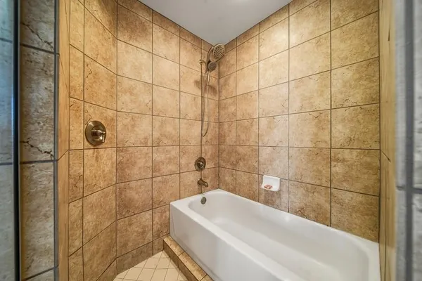 a bathroom with a bathtub